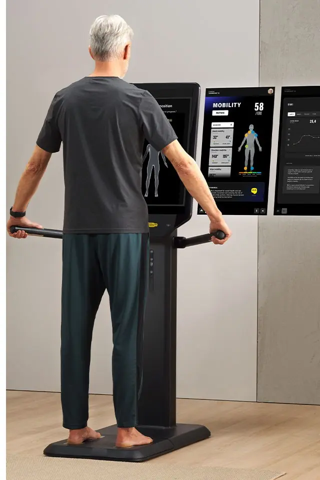A member using the Technogym Checkup station